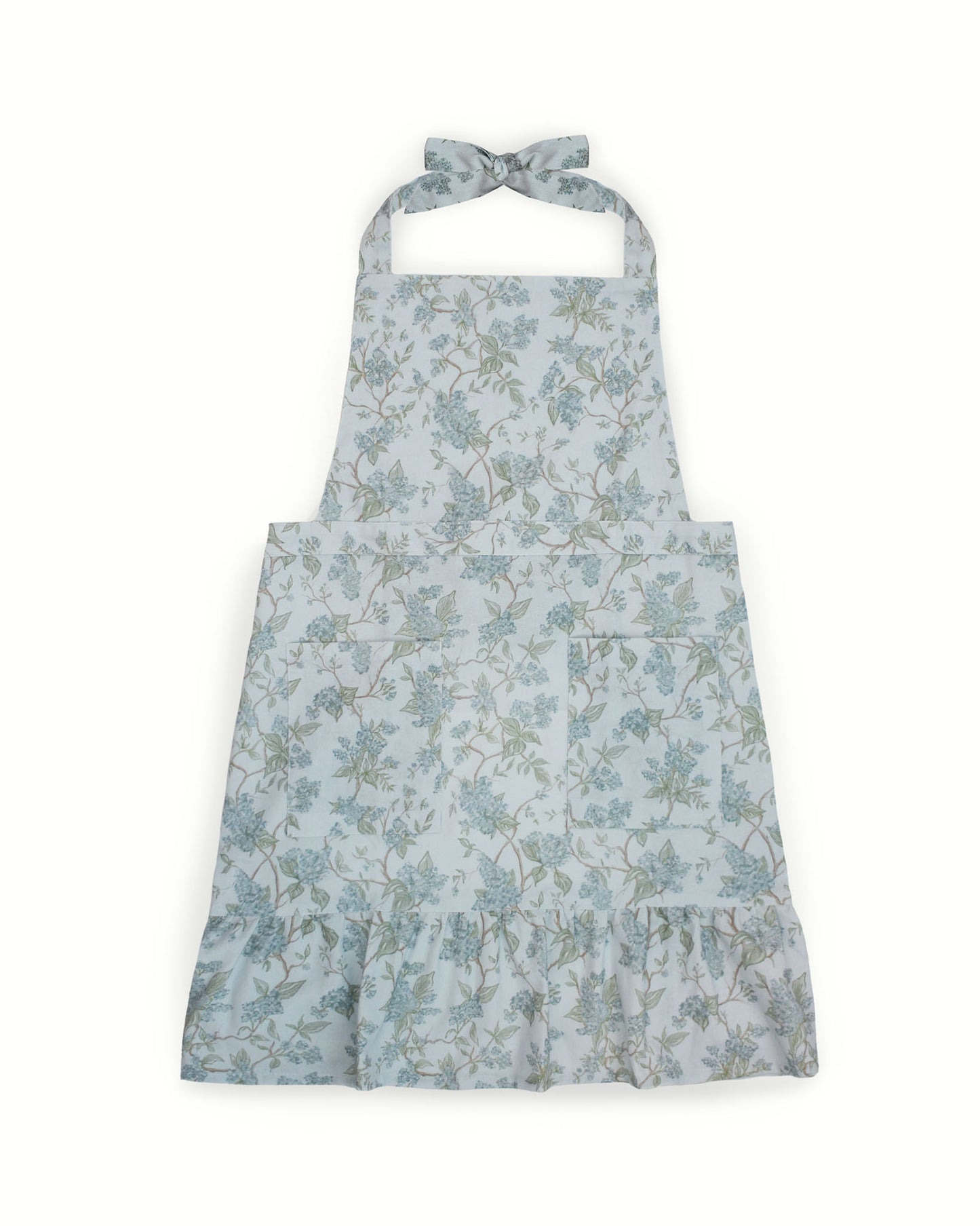 Hyacinth floral apron made from organic cotton, adjustable and functional for spring baking, summer cooking, and everyday kitchen use.