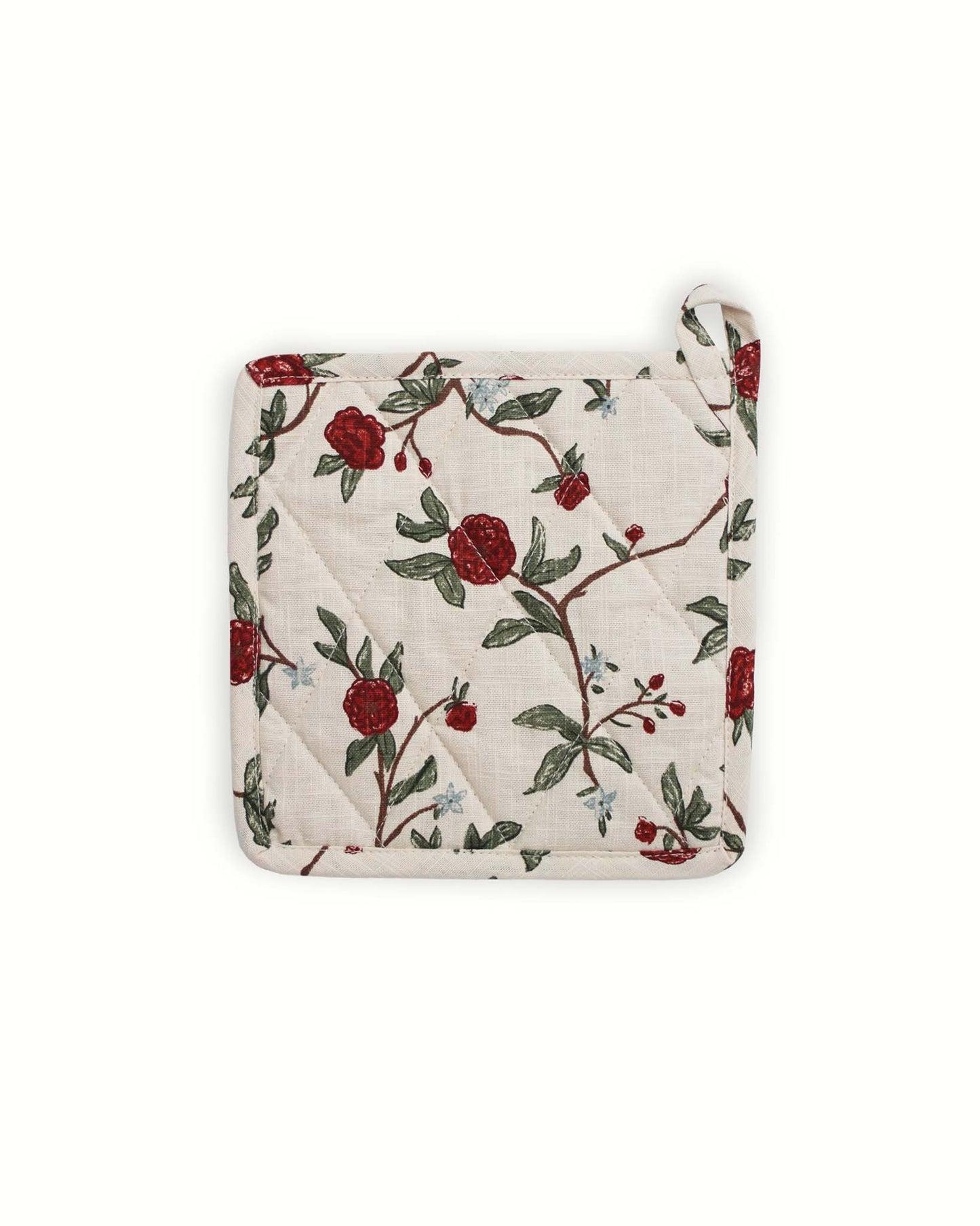 A close-up of floral printed pot holder set, featuring intricate botanical designs with red flowers and green leaves on a cream background. It comes with a small pocket to easily tuck in the wooden spoon showcasing its functionality in the kitchen
