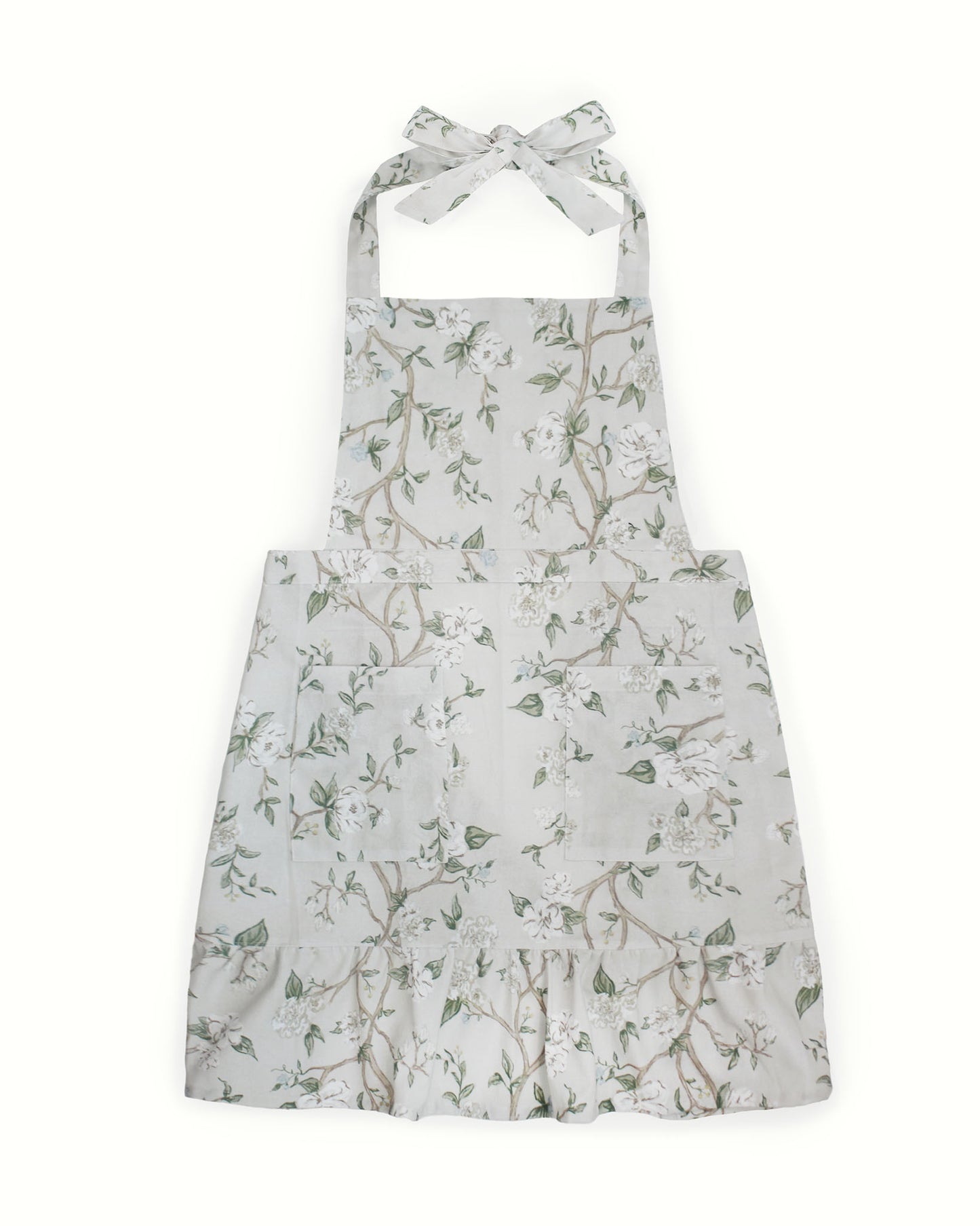 Camellia floral apron made from organic cotton, adjustable fit, perfect for cooking, baking, hosting, and everyday kitchen wear. The perfect hostess and Mothers Day gift.