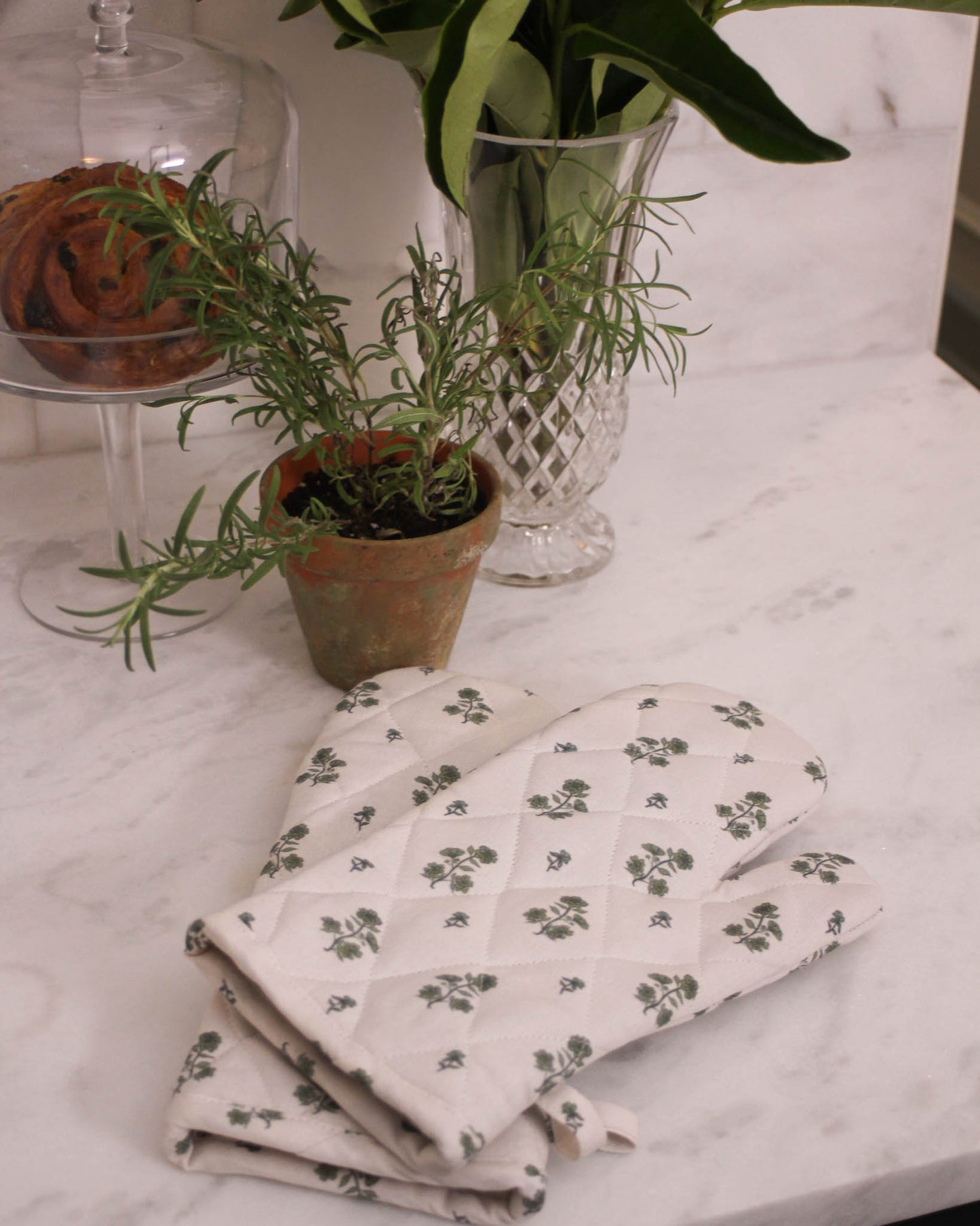 Organic cotton floral oven mitts, set of two, sustainable kitchen accessory for cooking and holiday gifting.