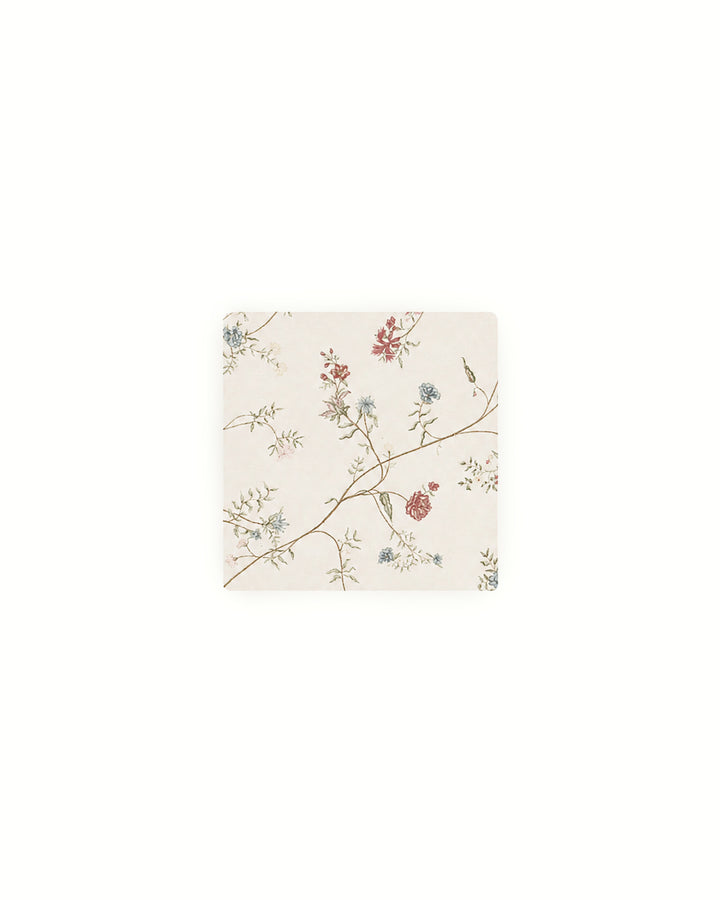 Set of four floral cocktail napkins made from premium cotton with a hand-drawn botanical print, perfect for drinks, appetizers, entertaining, and everyday hosting.