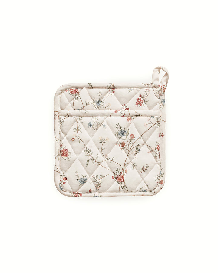 Patterned pot holder for cooking and baking, crafted from premium cotton and finished with quilted stitching for a beautiful, functional kitchen accessory.