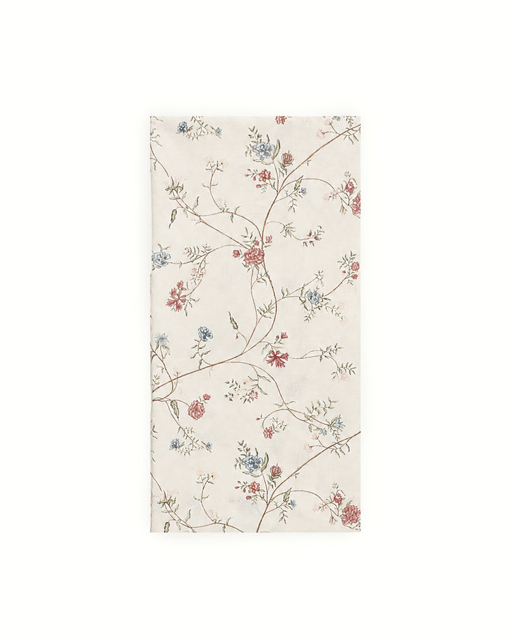 Floral cotton tea towel featuring a hand-drawn botanical print, perfect for drying dishes, lining bread baskets, styling the kitchen, and everyday use.