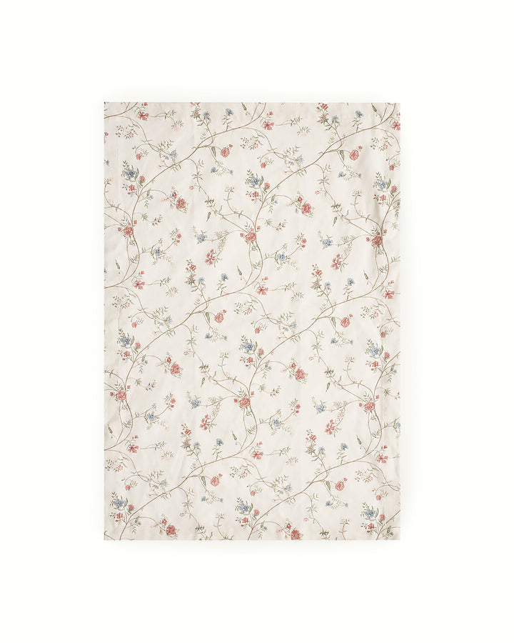 Floral cotton tea towel featuring a hand-drawn botanical print, perfect for drying dishes, lining bread baskets, styling the kitchen, and everyday use.
