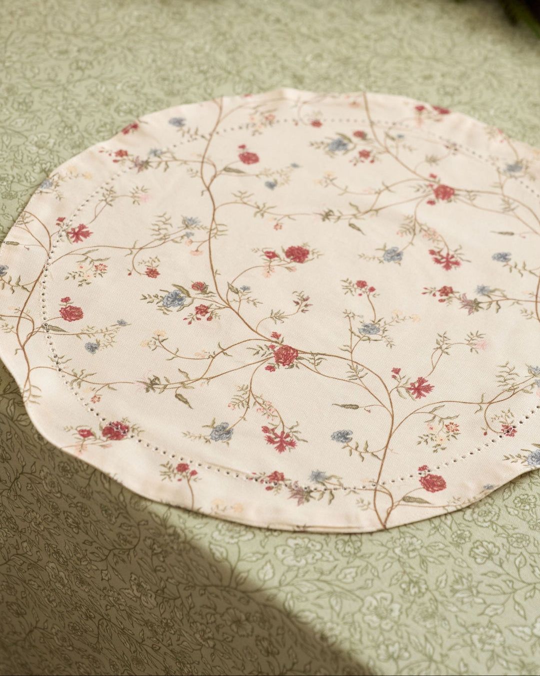 Neutral botanical placemats with an antique-inspired multicolor floral print for weddings, seasonal gatherings, and everyday tables.