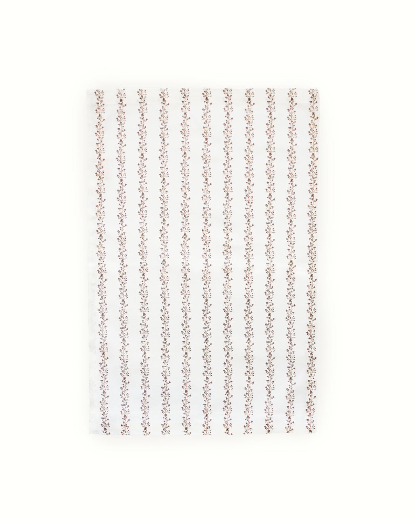 Festive tea towel in organic cotton with hand-drawn floral stripe. Hanging loop for holiday kitchen display. Perfect Christmas hostess gift, sustainably made.