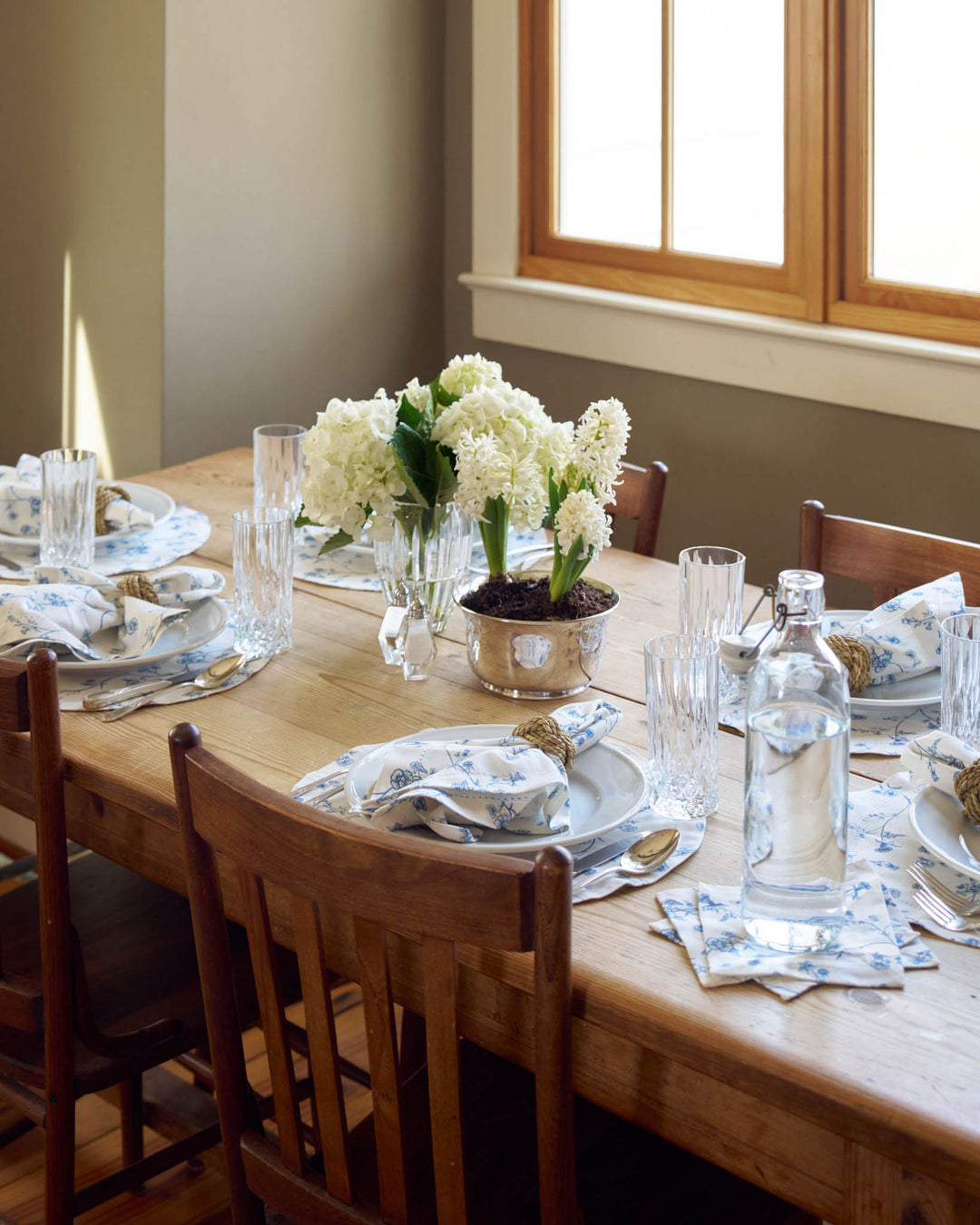 Blue and white Garden Vine placemats, set of 4 in premium cotton Charleston print, ideal for Southern living inspired tables, from casual meals to gatherings.