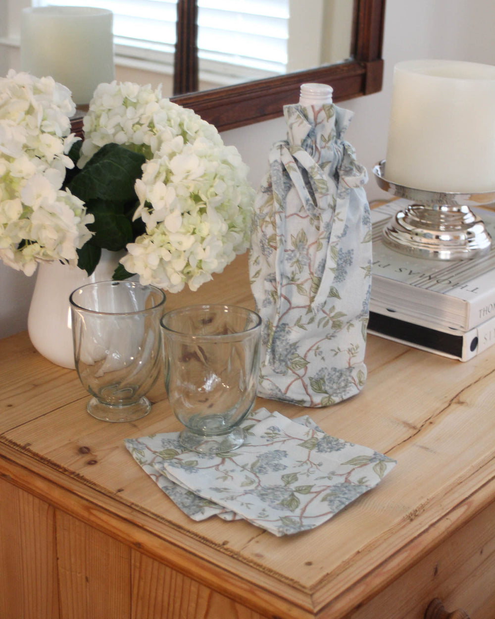 Blue floral cotton wine bag, ideal for wrapping wine, olive oil, or homemade gifts for special occasions.