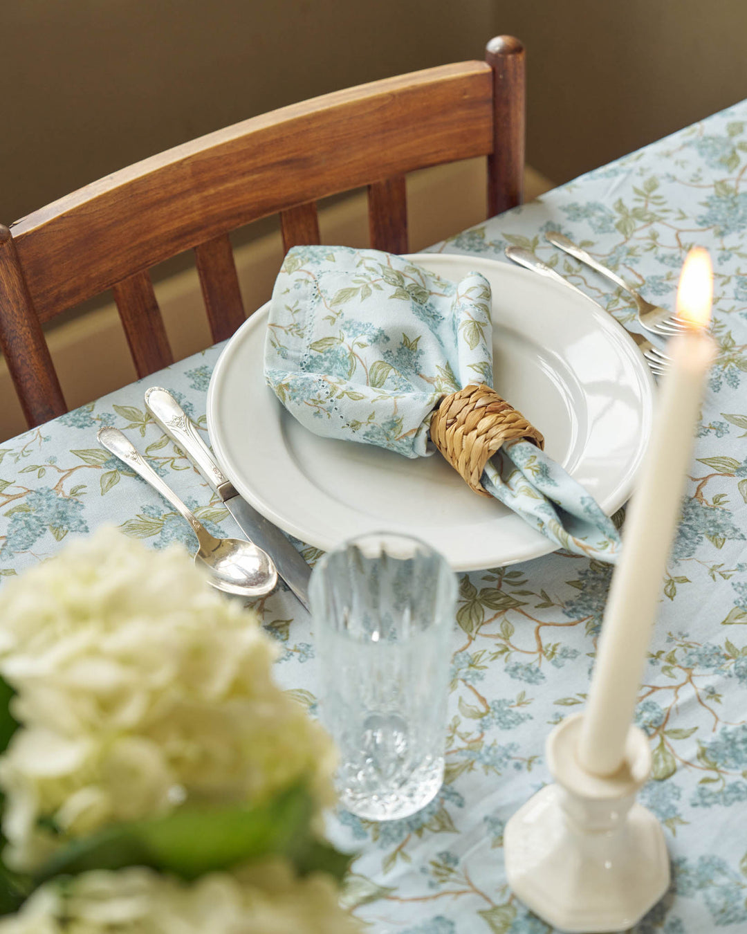Blue floral cotton napkins designed for Easter hosting and everyday tables.
