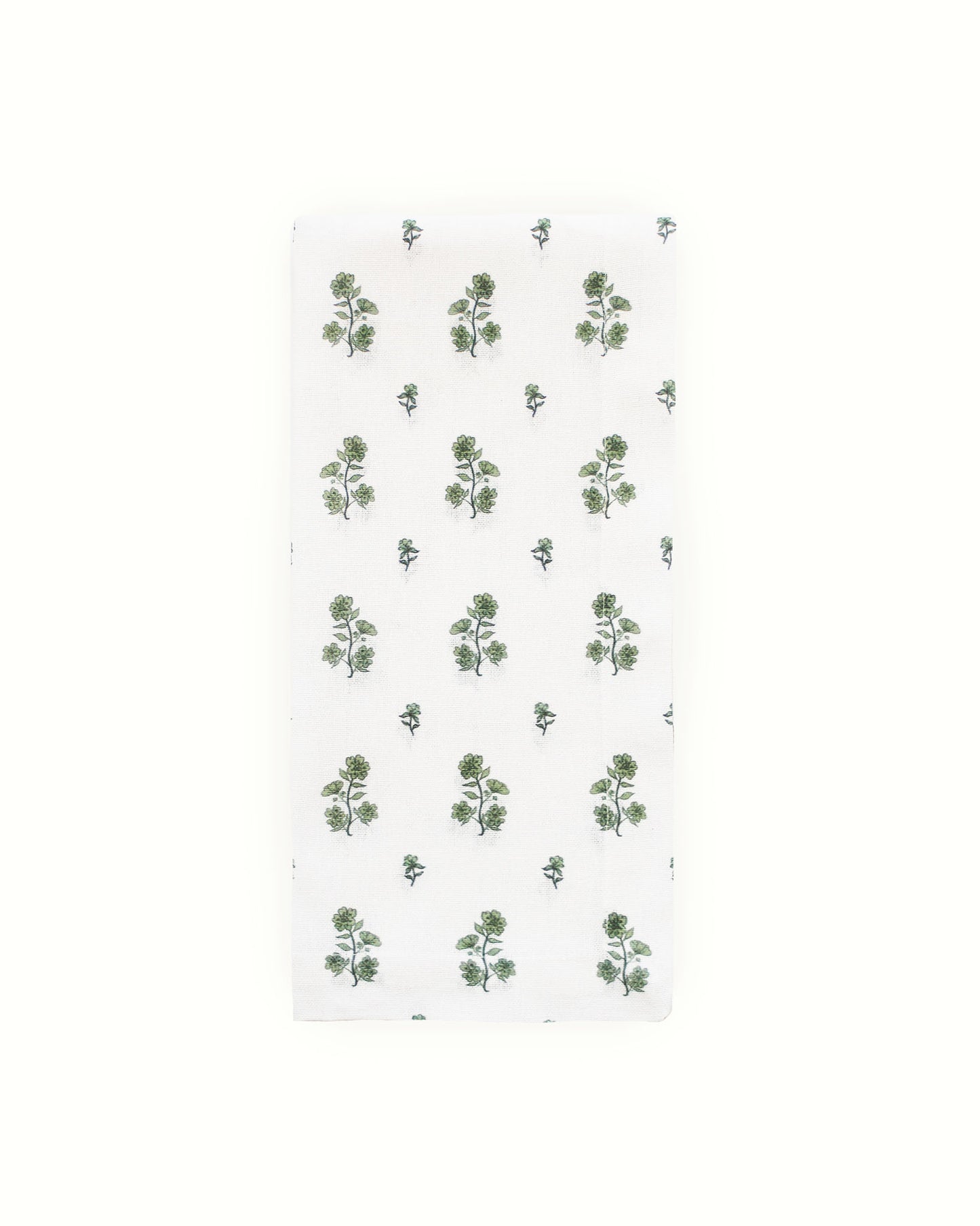 Festive tea towel in organic cotton with hand-drawn floral pattern. Hanging loop for holiday kitchen display. Perfect Christmas hostess gift, sustainably made.