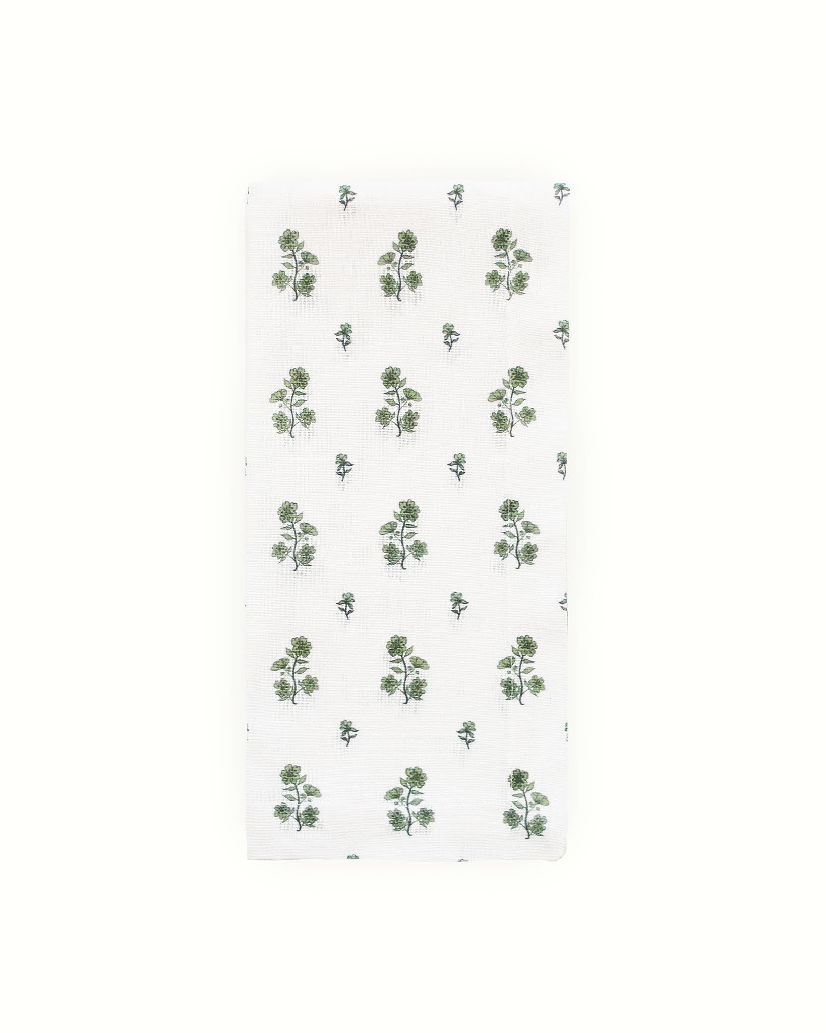 Festive tea towel in organic cotton with hand-drawn floral pattern. Hanging loop for holiday kitchen display. Perfect Christmas hostess gift, sustainably made.