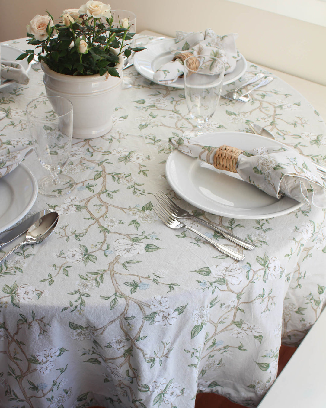 Floral wedding tablecloth featuring a soft blue and green botanical print inspired by classic chinoiserie and French country style. This cotton tablecloth drapes beautifully over rectangular tables, making it ideal for wedding receptions, rehearsal dinners, and spring celebrations. Designed as a farmhouse table cover with a timeless toile feel, it works beautifully as an Easter tablecloth or everyday linen for grand millennial decor and elegant Easter table decor.