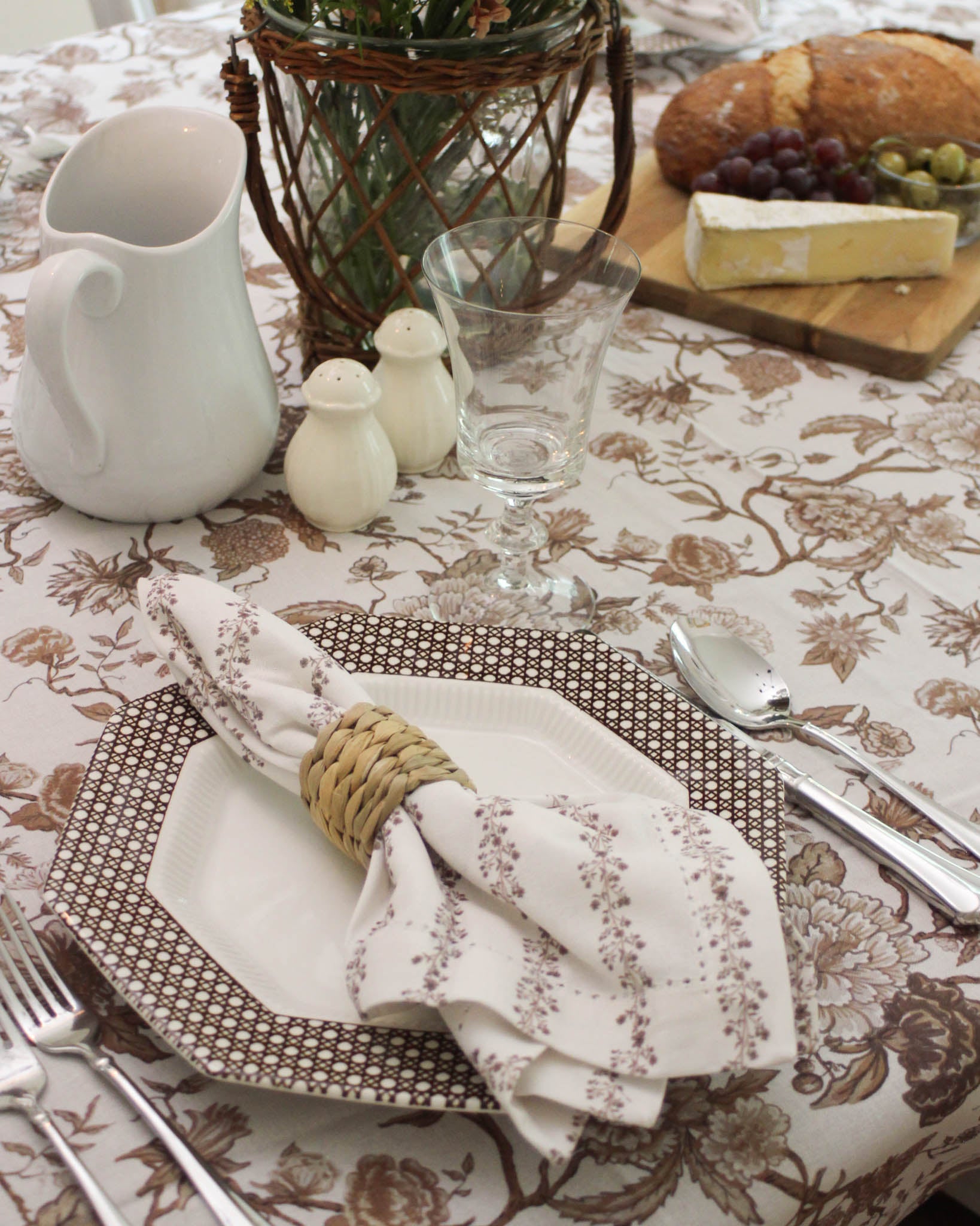 Sustainable organic cotton floral tablecloth in warm tones of trending chestnut brown color for Thanksgiving and holiday gatherings