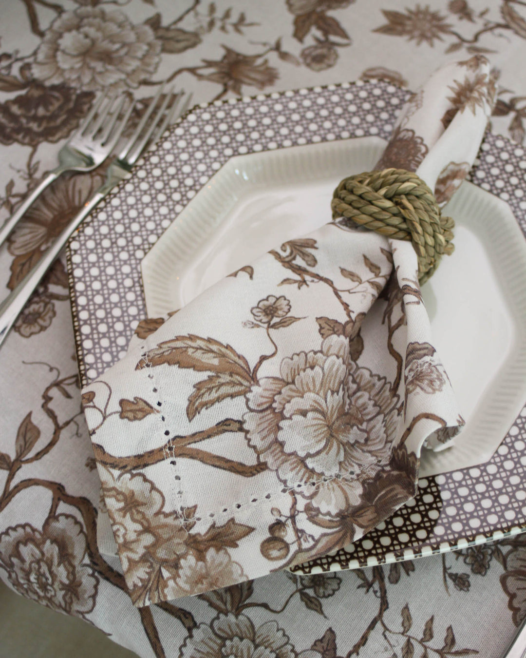 Brown floral cloth napkins set of 4 in 100% cotton with hemstitch detail, perfect for everyday dining and elegant table settings.