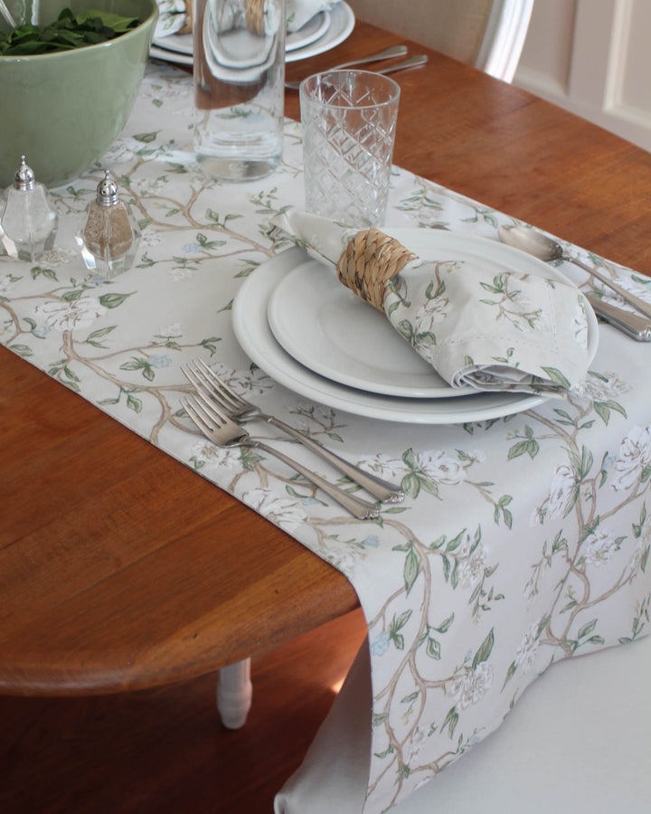 Camellia floral table runner with classic Southern charm, featuring hand-drawn garden rose motifs in timeless green. Perfect for summer tablescape or Mother's Day gift.
