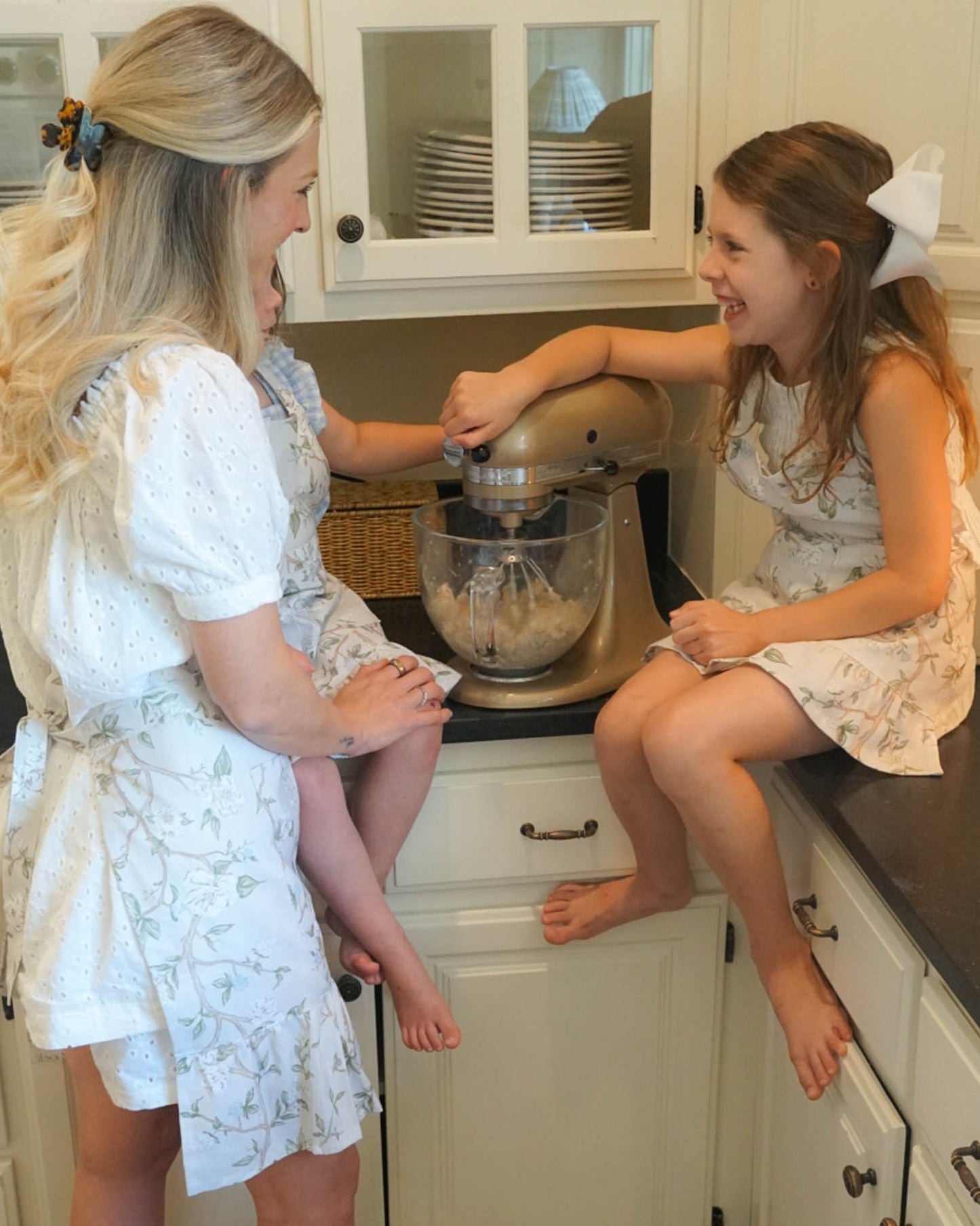 Mommy and me matching Camellia aprons in soft floral print, inspired by chinoiserie floral, perfect for cooking and baking and crafting.