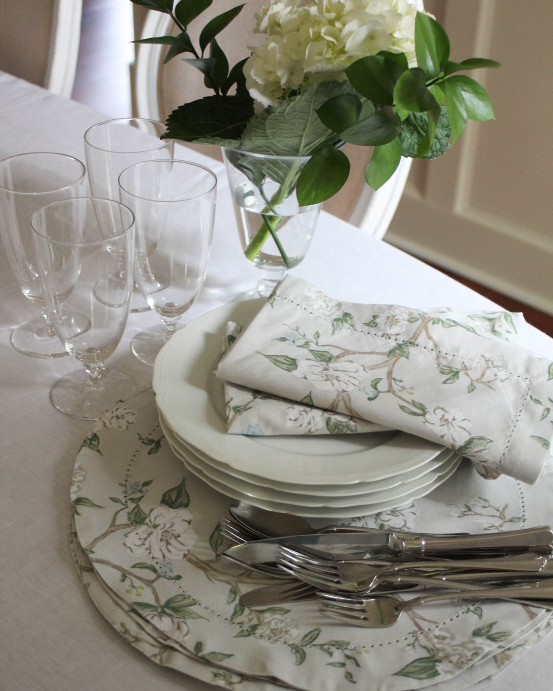 Refined Camellia fabric placemats for classic entertaining, featuring hand-illustrated blooms on soft organic cotton, perfect for Mother's Day gift or tablescape.