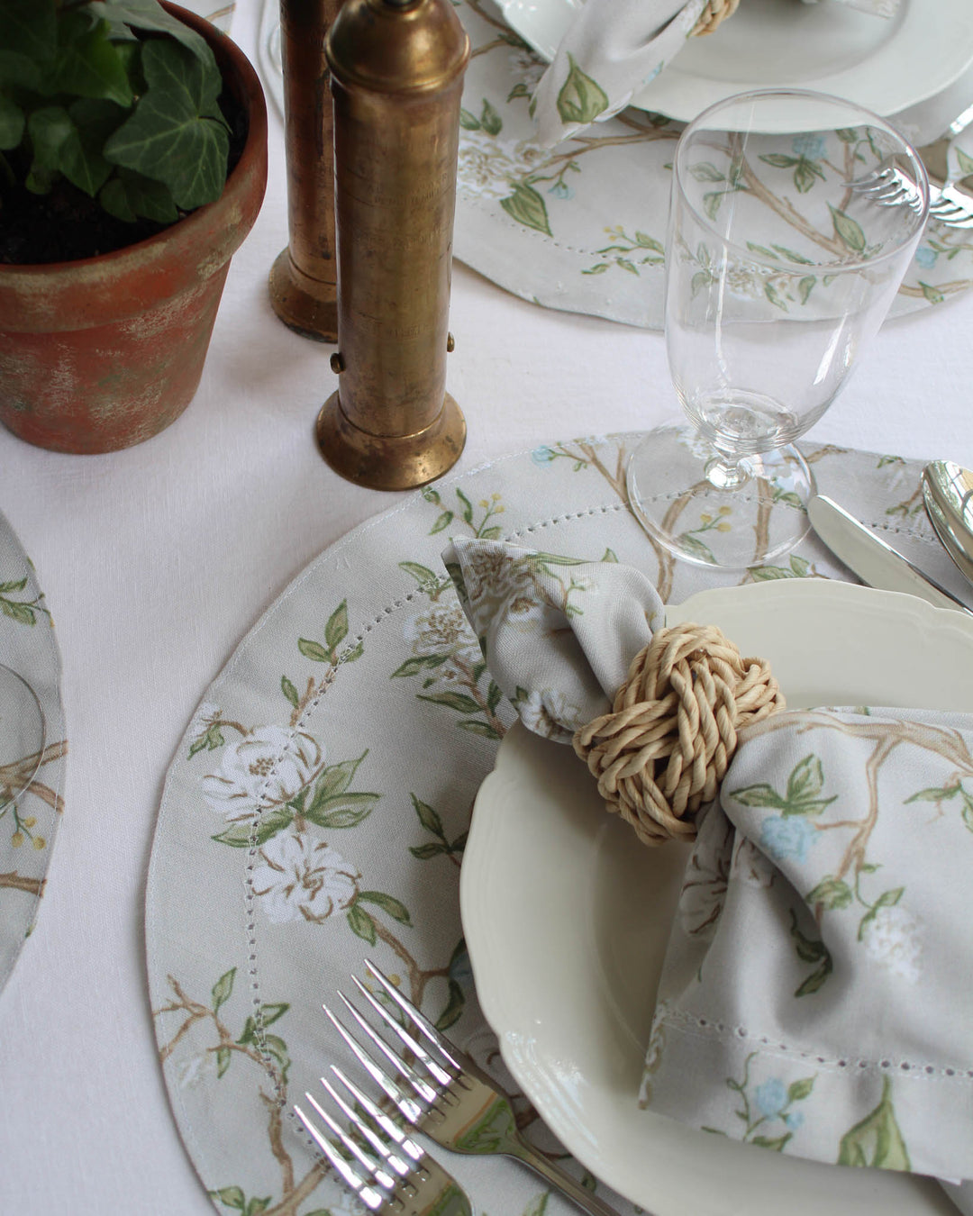 Camellia round placemats set of four by Willamere, featuring a timeless hand-drawn floral print in a soft neutral palette for elegant table settings, wedding tablescapes, holiday gatherings, bridal showers, and everyday dining.