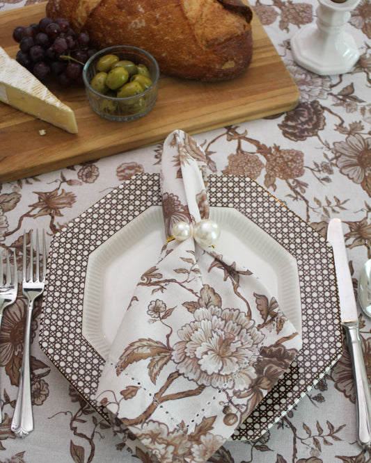Elevate your Christmas table with Florence floral napkins. 100% organic cotton, hemstitch detail. Set of 4. Perfect for festive holiday entertaining.