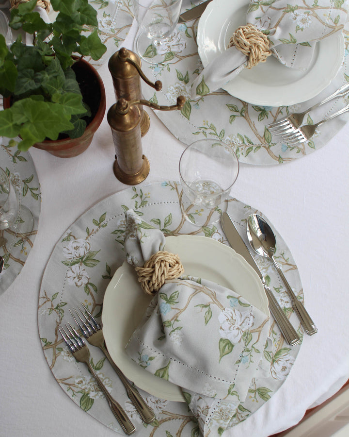 Set of four Camellia Floral cloth napkins by Willamere, designed with a timeless botanical floral pattern for layered place settings, summer entertaining, wedding registries, holiday gatherings, and classic dinner party tables.