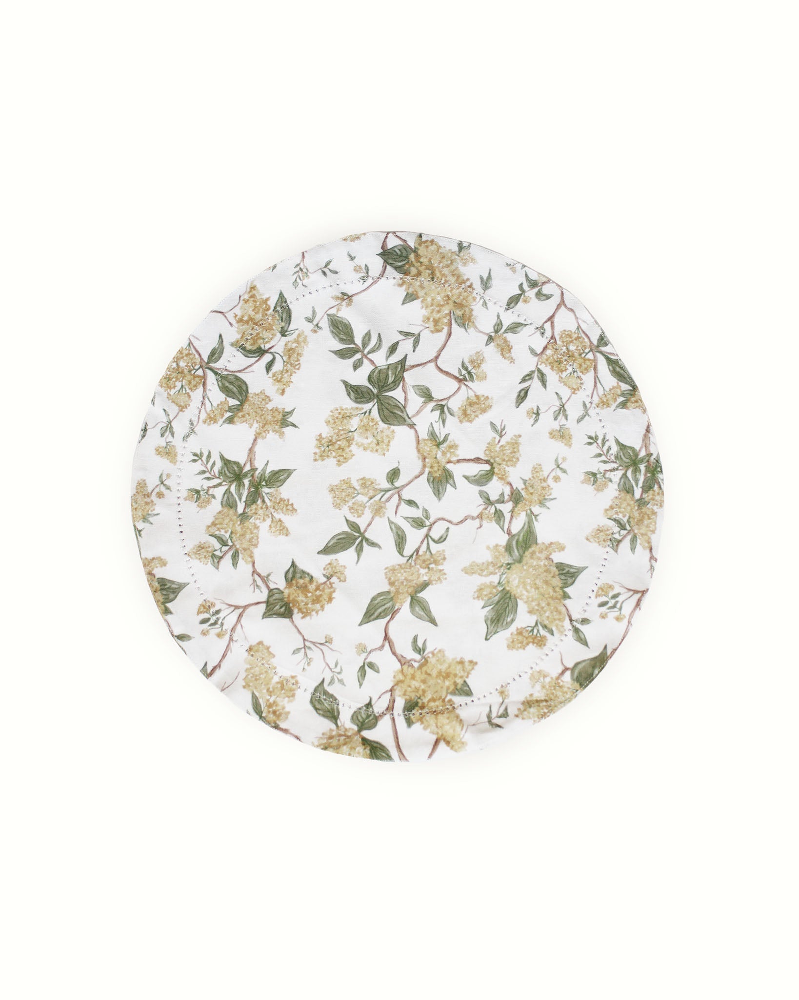 Yellow floral round placemats with hemstitch detail