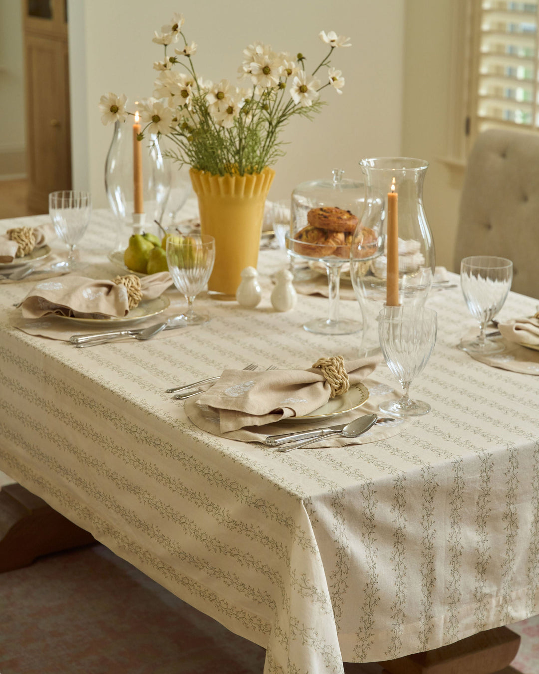 Neutral floral stripe tablecloth in sage green, pale yellow, and tan for Easter brunch, spring hosting, fall gatherings, and Thanksgiving dinner.