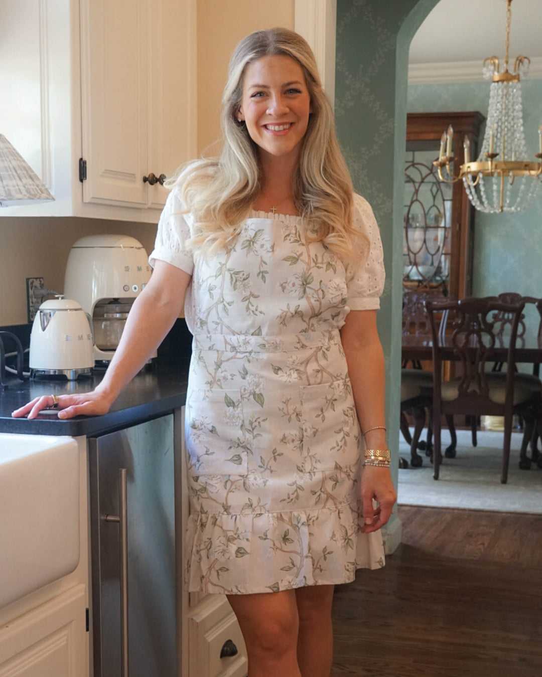 Womens classic cream floral apron with ruffle hem, perfect birthday gift or hostess gift.