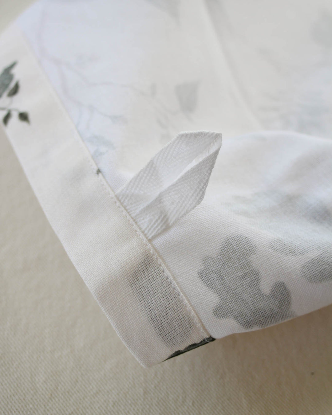 Willamere botanical tea towel in soft neutral tones, a timeless kitchen accessory and thoughtful holiday hostess gift.
