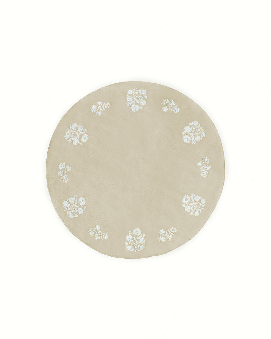 Set of 4 classic round placemats in a neutral beige color, featuring delicate white floral embroidery. Perfect for Easter, spring, and summer tablescapes, these timeless reusable placemats add charm and sophistication to any dining setting.
