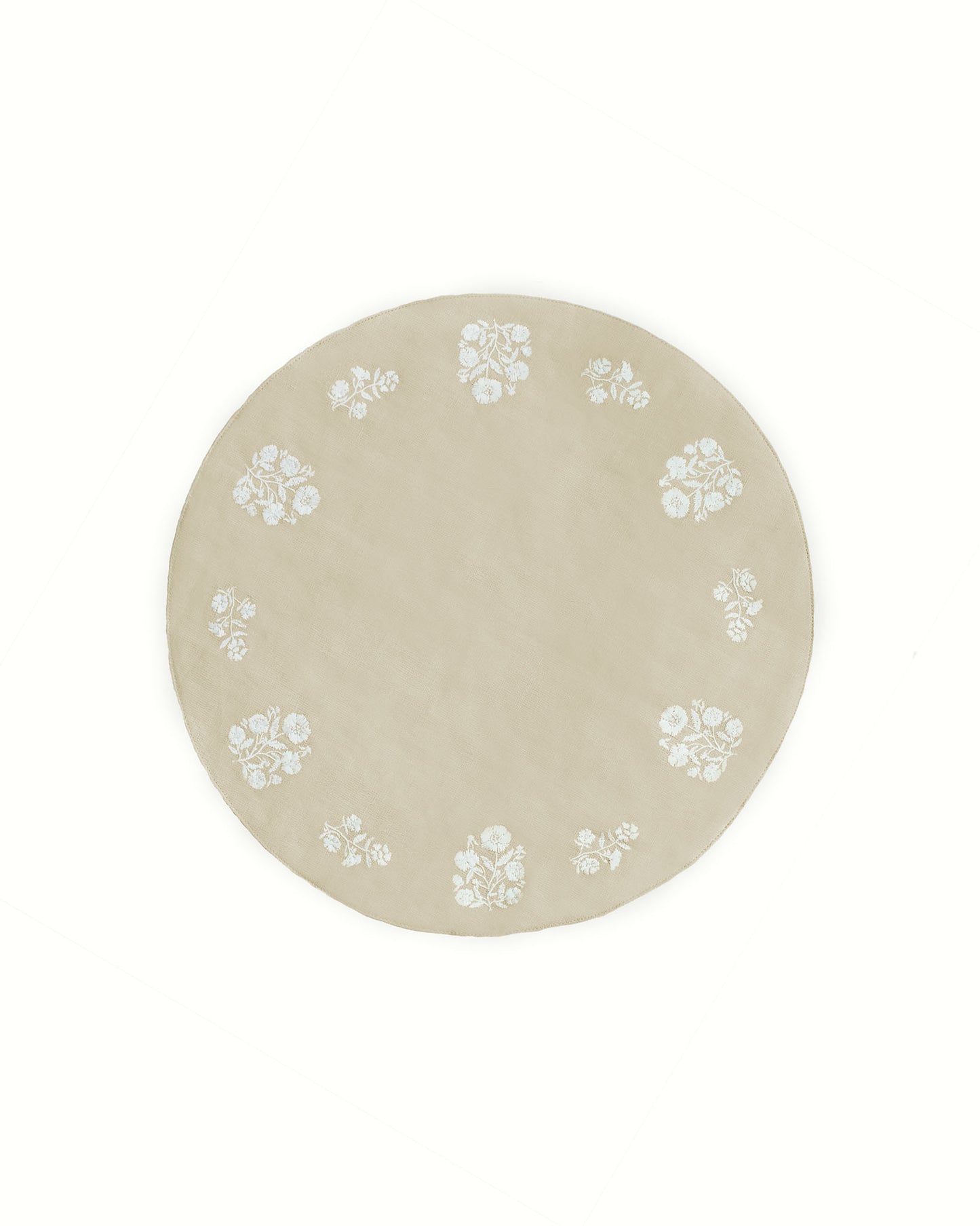 Set of 4 classic round placemats in a neutral beige color, featuring delicate white floral embroidery. Perfect for Easter, spring, and summer tablescapes, these timeless placemats add charm and sophistication to any dining setting.