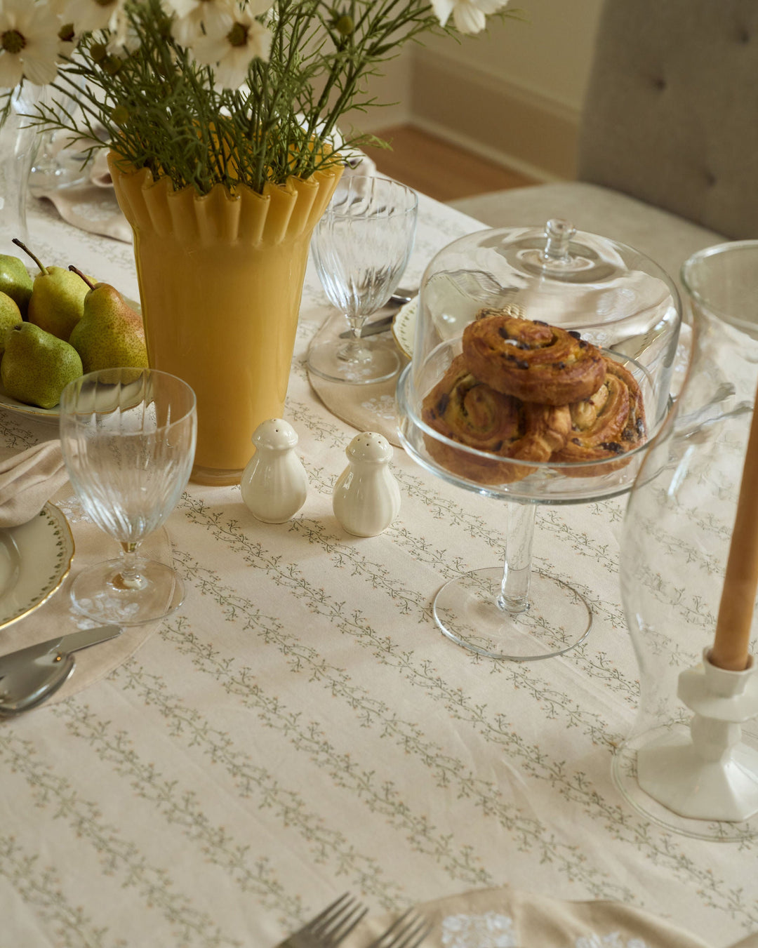 Botanical cotton tablecloth with sage green and pale yellow floral stripes for Easter celebrations, spring dining, fall gatherings, and neutral Thanksgiving decor.