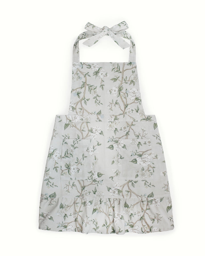 Camellia floral apron made from 100% cotton, adjustable fit, perfect for cooking, baking, hosting, and everyday kitchen wear. The perfect hostess and Mothers Day gift.