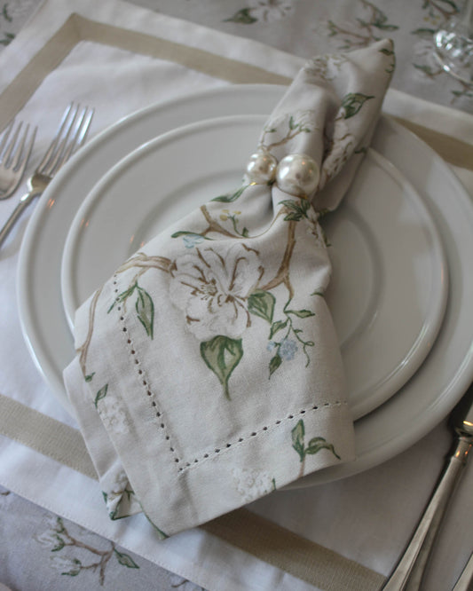 Heirloom-style Camellia cloth napkins in a romantic botanical print, perfect for spring, holiday, or year-round gatherings