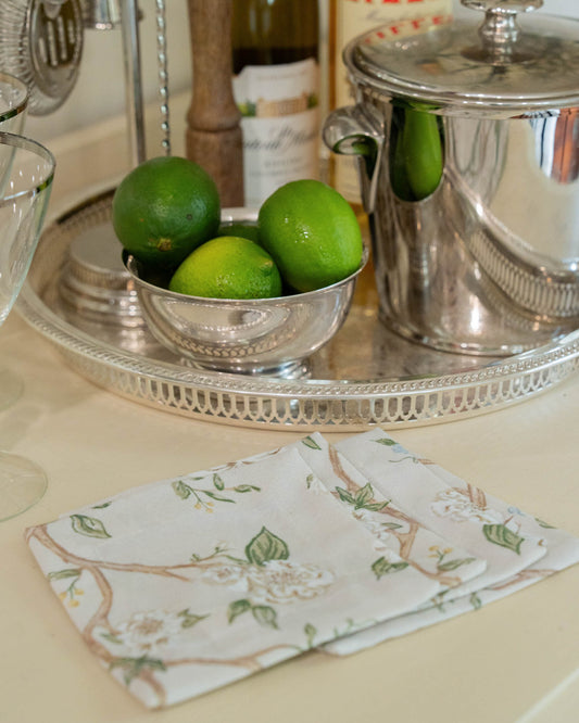 Camellia floral cocktail napkins and fabric coasters made from organic cotton, perfect for spring entertaining and seasonal hosting.