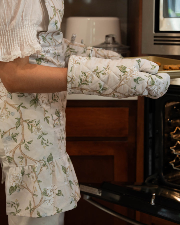 Floral oven mitt and matching apron perfect for baking and cooking or as a wedding gift.