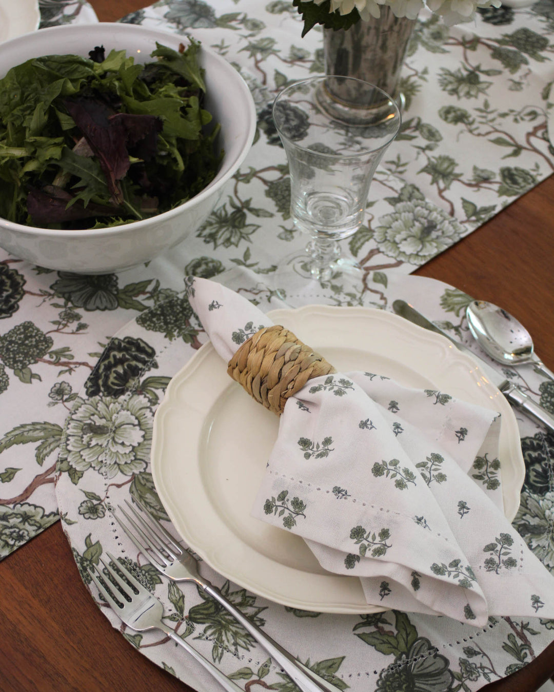 Warm green floral  table runner in premium cotton, layered with coordinating napkins and placemats perfect for Easter or Mothers Day brunch, wedding table decor.