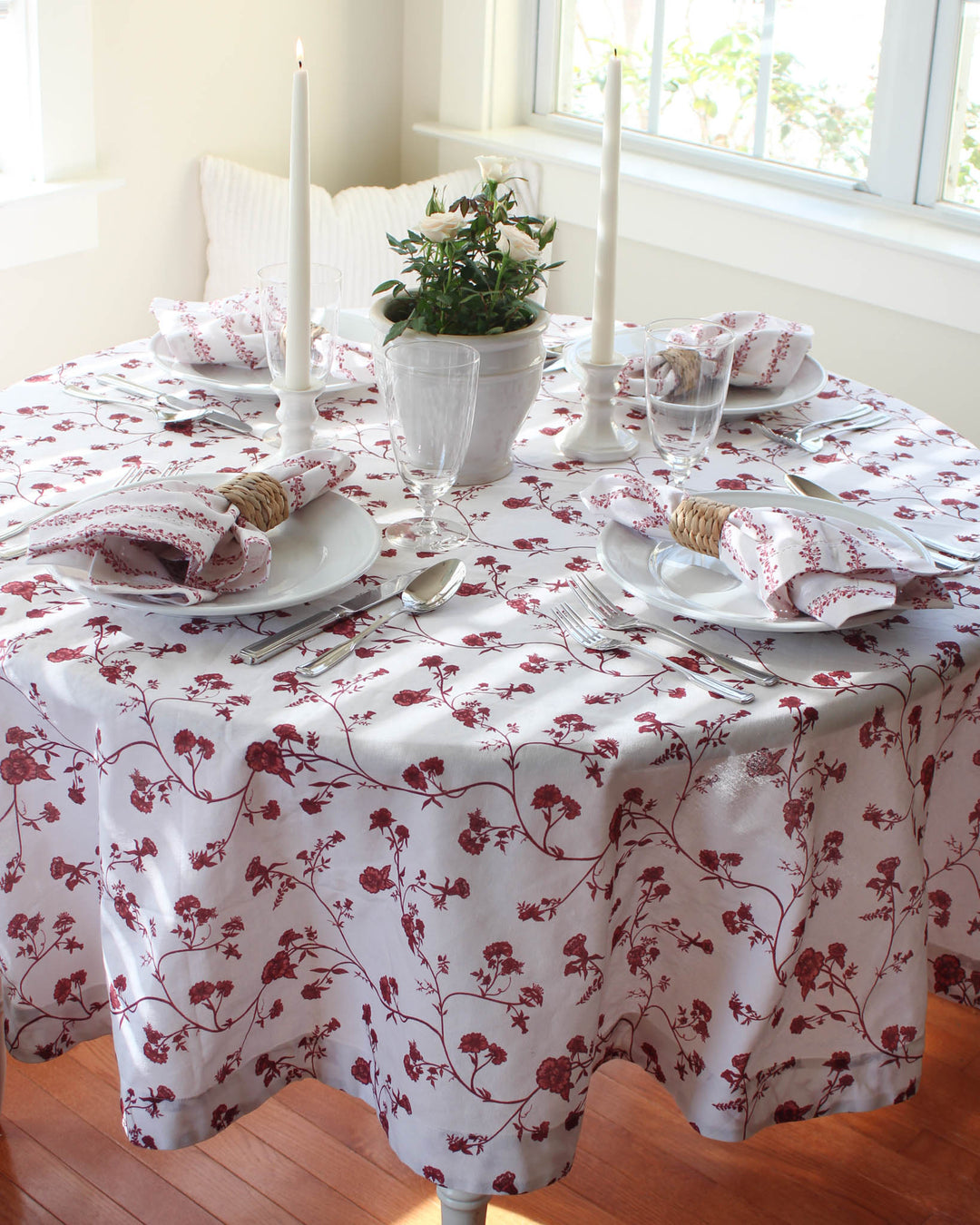 Wedding Garden Party Tablecloth in a red Chinoiserie Print. This 70" round tablecloth doubles as a stunning Rehearsal Dinner piece. The Cotton Tablecloth fabric is hand-drawn with floral motifs, perfect for Easter Table Decor.. This Floral Tablecloth is a great gift for a wife who loves hosting. Combine with other linens for a curated Spring Tablecloth look.