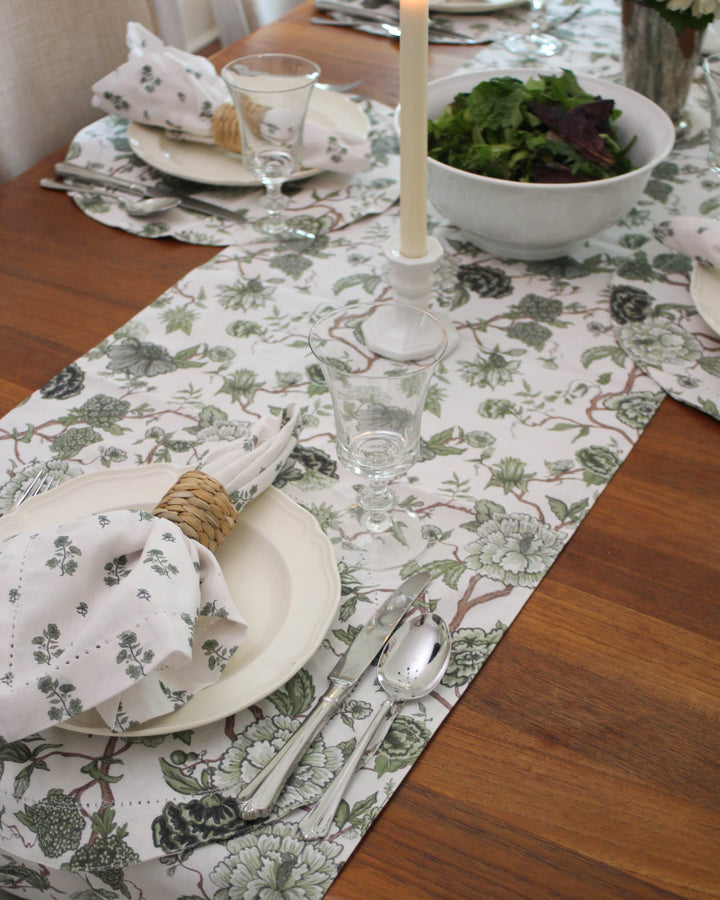 Green floral table runner in premium cotton with hand-drawn floral design, styled for Easter table decor