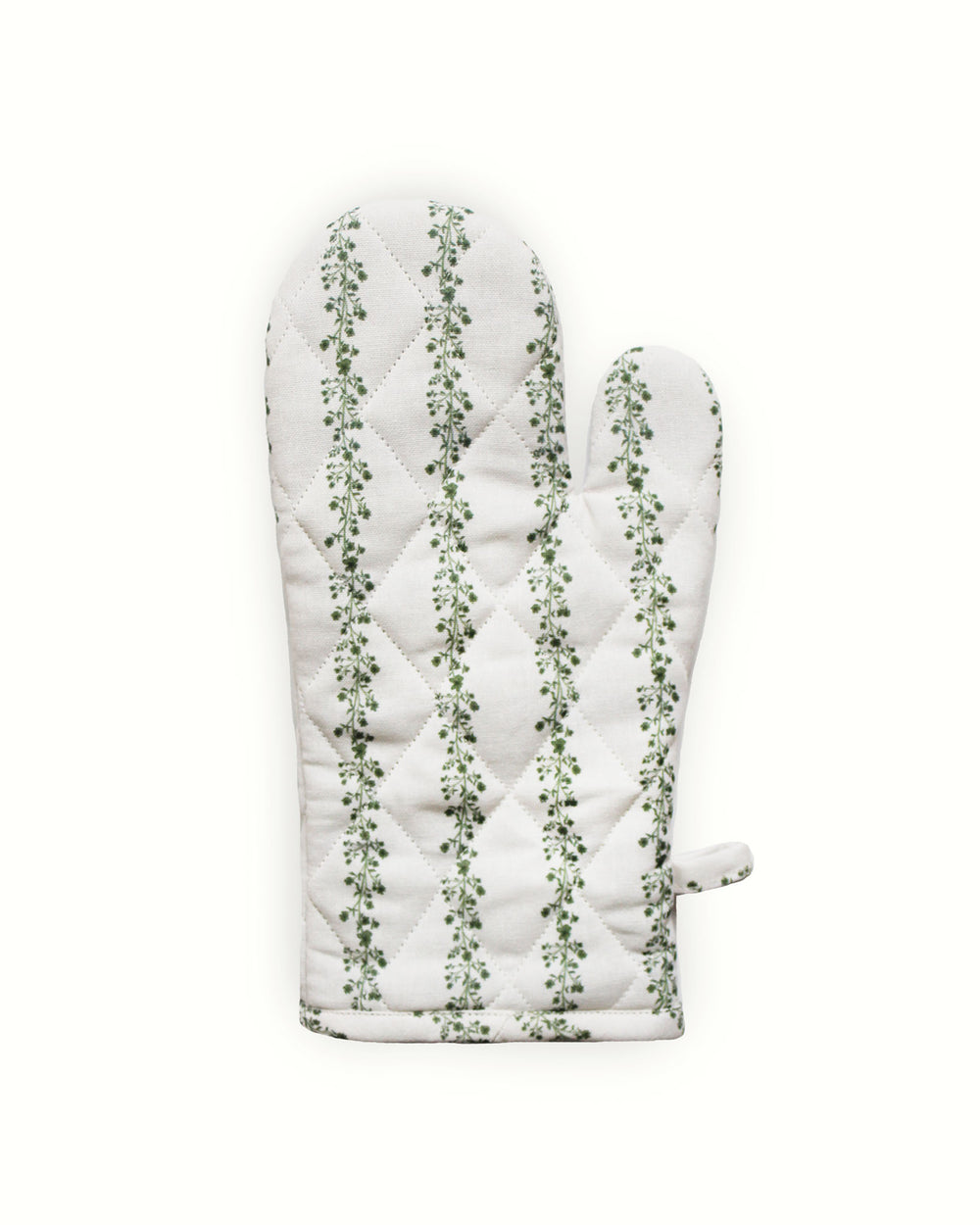 Intricate diamond-quilted oven mitts in a signature  green floral striped print. Every stitch reflects a commitment to heirloom quality and artistic design. These long kitchen gloves are perfect for protecting your hands from hot trays while maintaining an elegant, high-end look. The hand-drawn floral vines make these mitts a beautiful focal point when hanging in your kitchen, blending traditional artistry with everyday practical functionality.