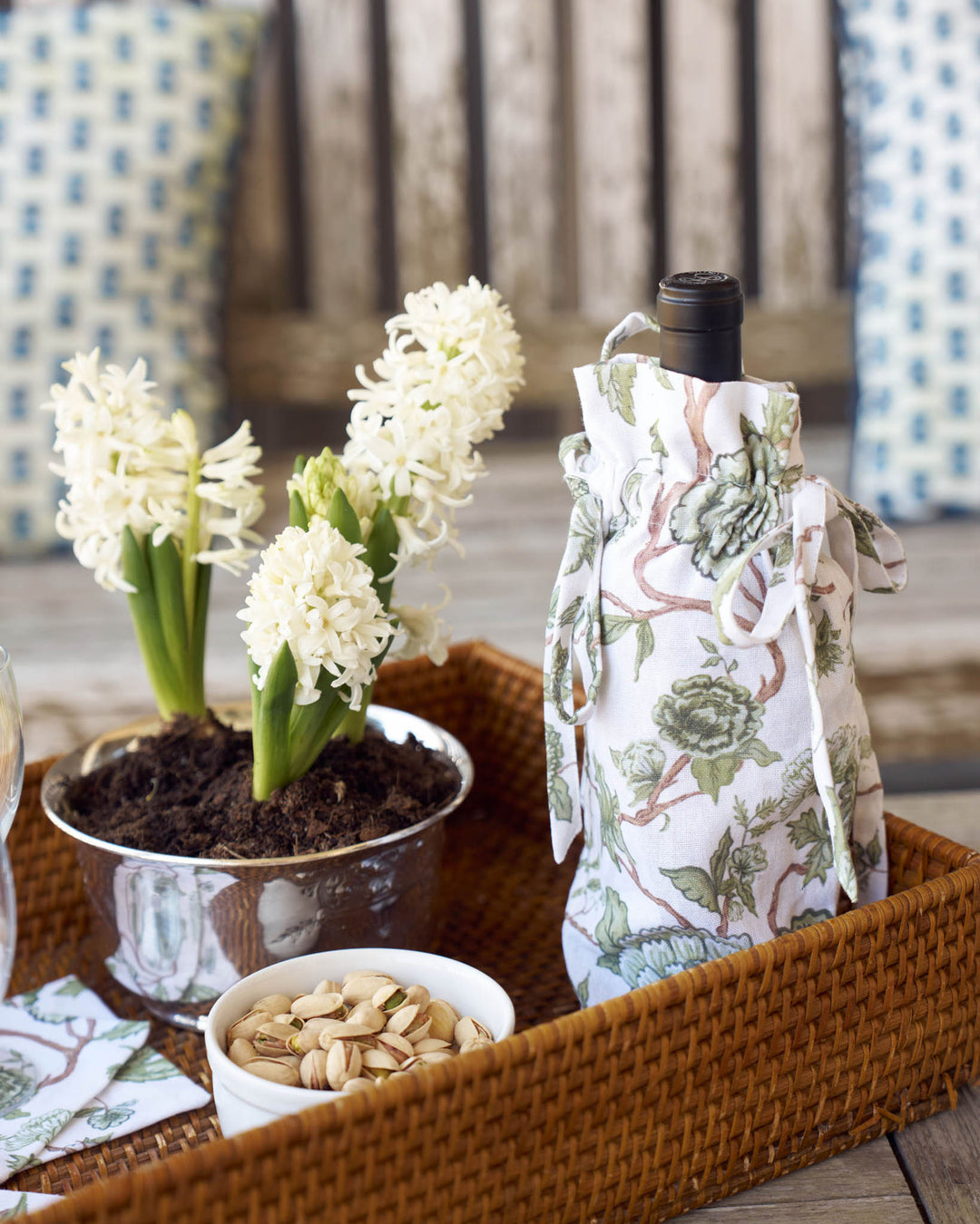 Floral cotton wine bag with drawstring closure, perfect for gifting wine, olive oil, or homemade treats.