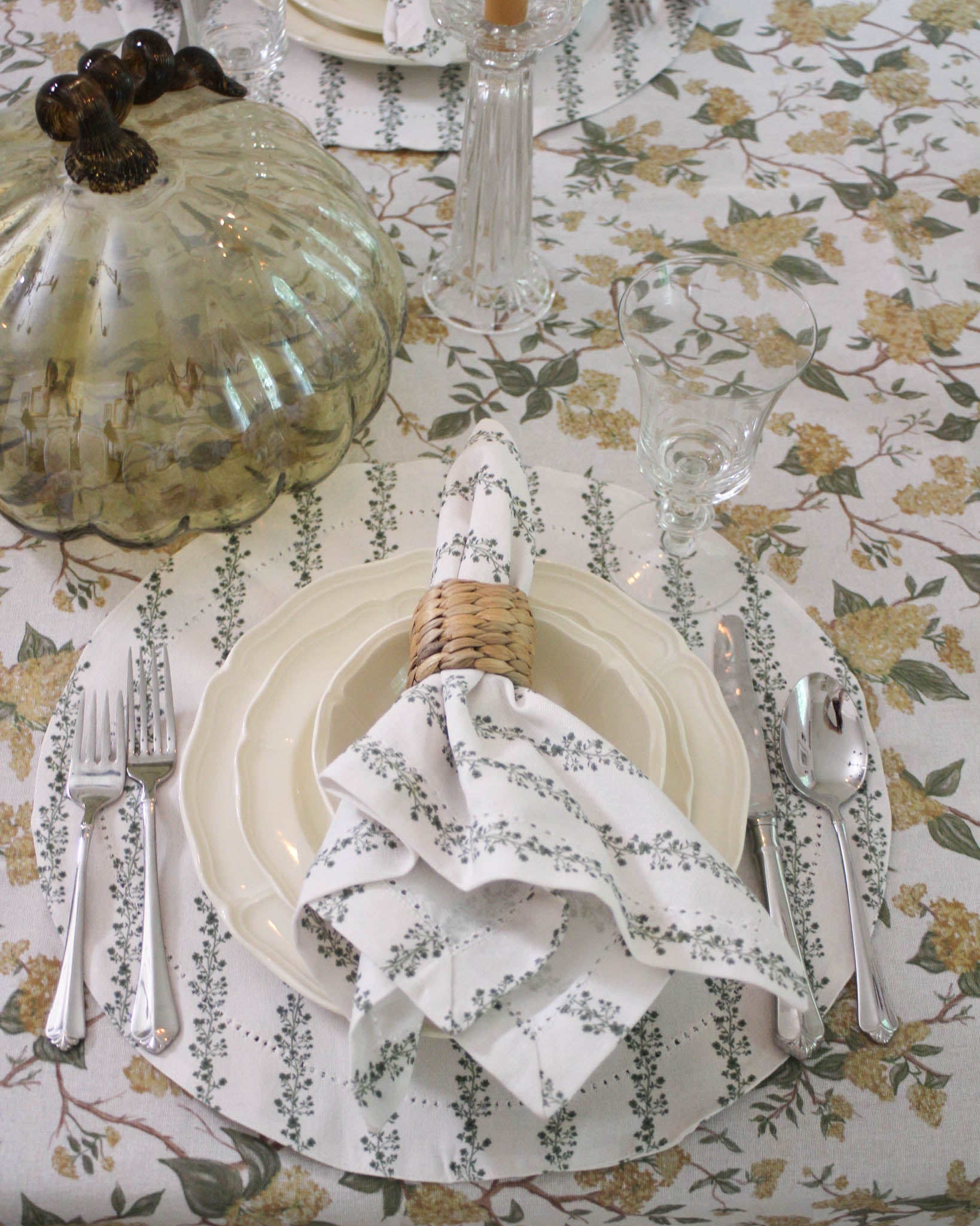 Begonia Green Stripe napkins in organic cotton with hand-drawn floral. Hemstitch detail, set of 4. Perfect for layering and mixing for holiday table decor. Ethically made in India.