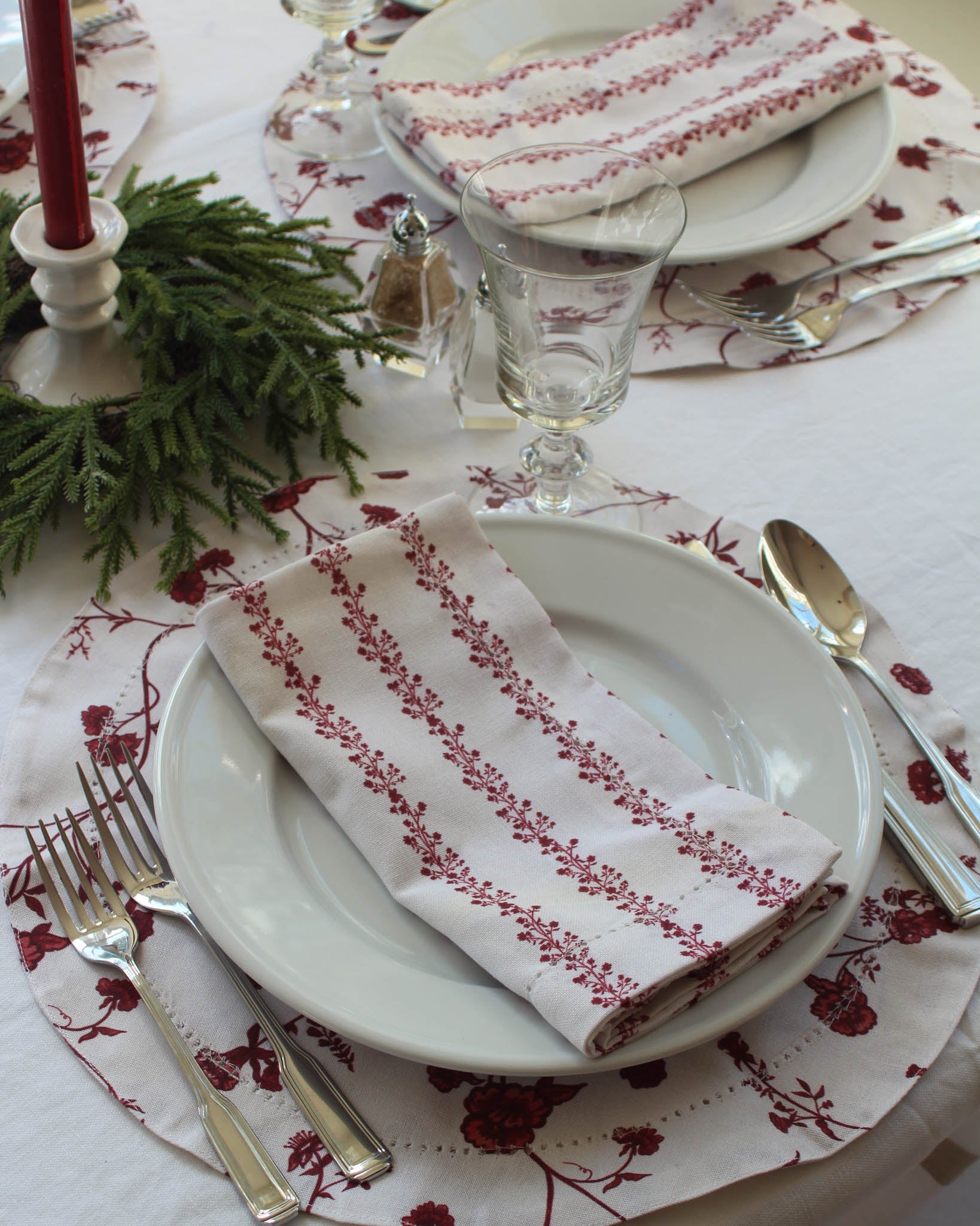 Hand-drawn floral round placemats that pair beautifully with matching napkins and tablecloth. Perfect for holiday hosting or gifting