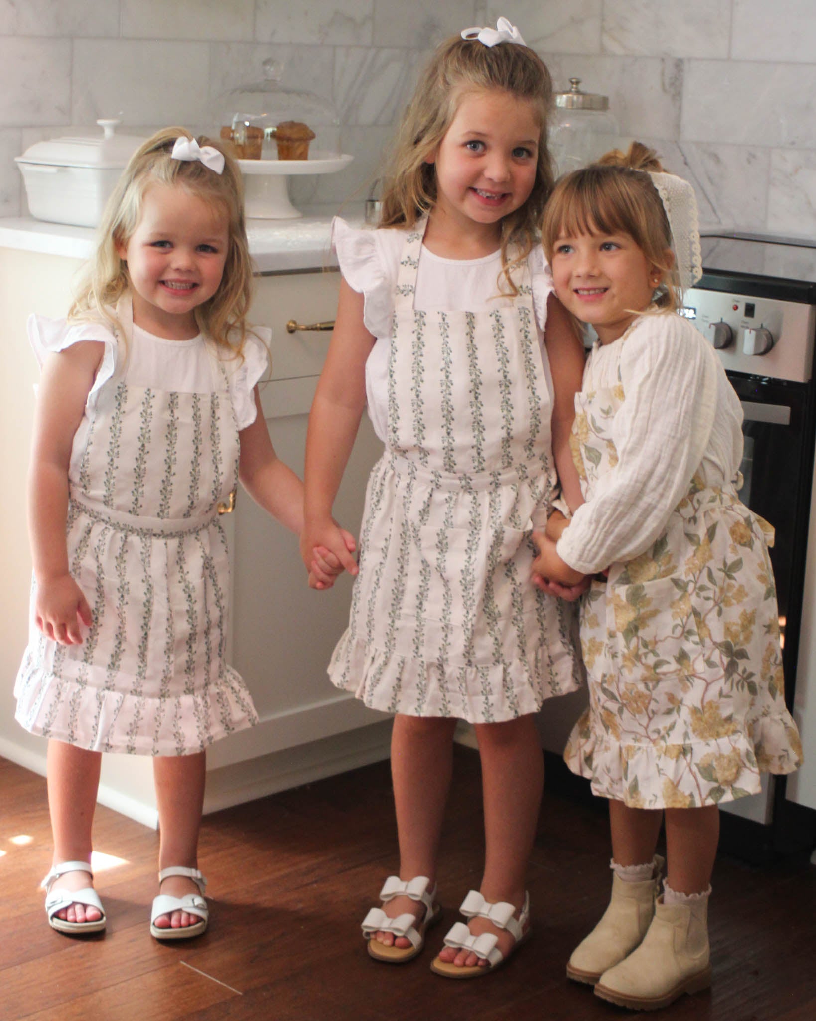 tripe apron with front pockets and adjustable fit, designed for cozy holiday baking and cooking