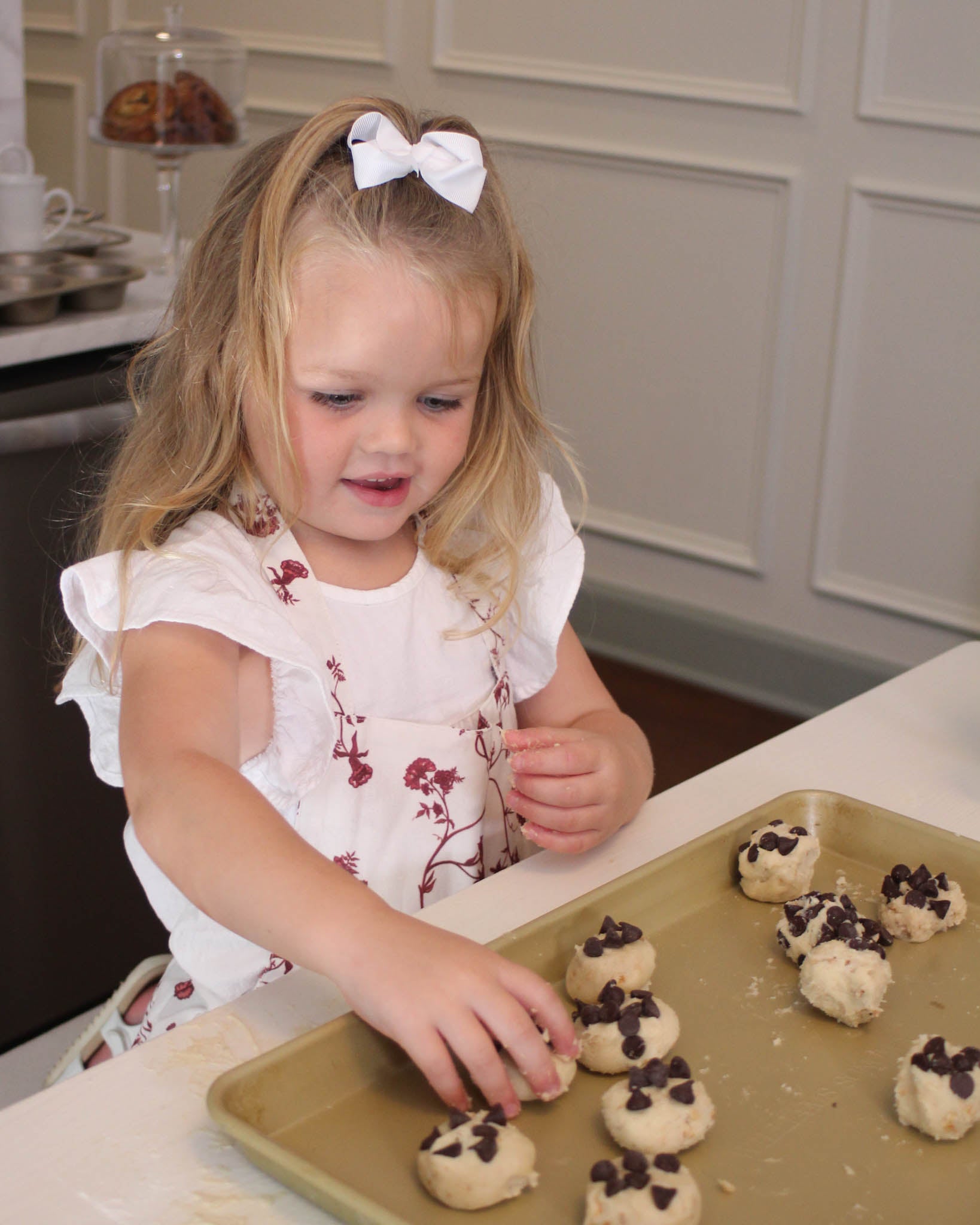 The Little Garden Vine Apron—sweet, sustainable, and made for festive family baking days.