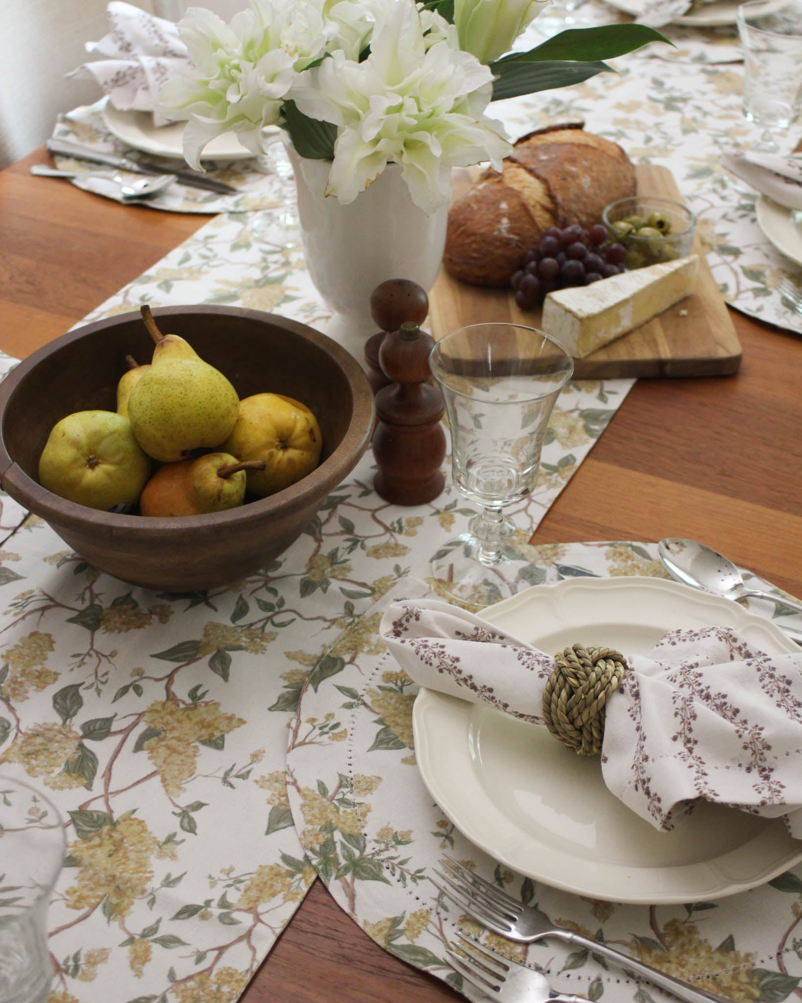 Hyacinth Marigold table runner in organic cotton with hand-drawn floral pattern, perfect for fall dining decor