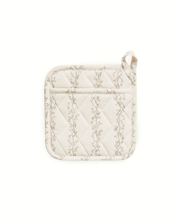 Quilted floral pot holder made from premium cotton with a hand-drawn botanical print, designed for baking, cooking, and everyday kitchen use.