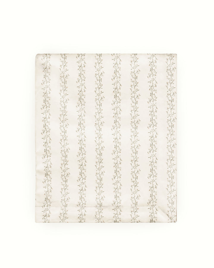 Decorative floral tablecloth with an original hand-drawn design, made to bring color and pattern to kitchen tables, dining rooms, holiday tablescapes, and elegant gatherings.