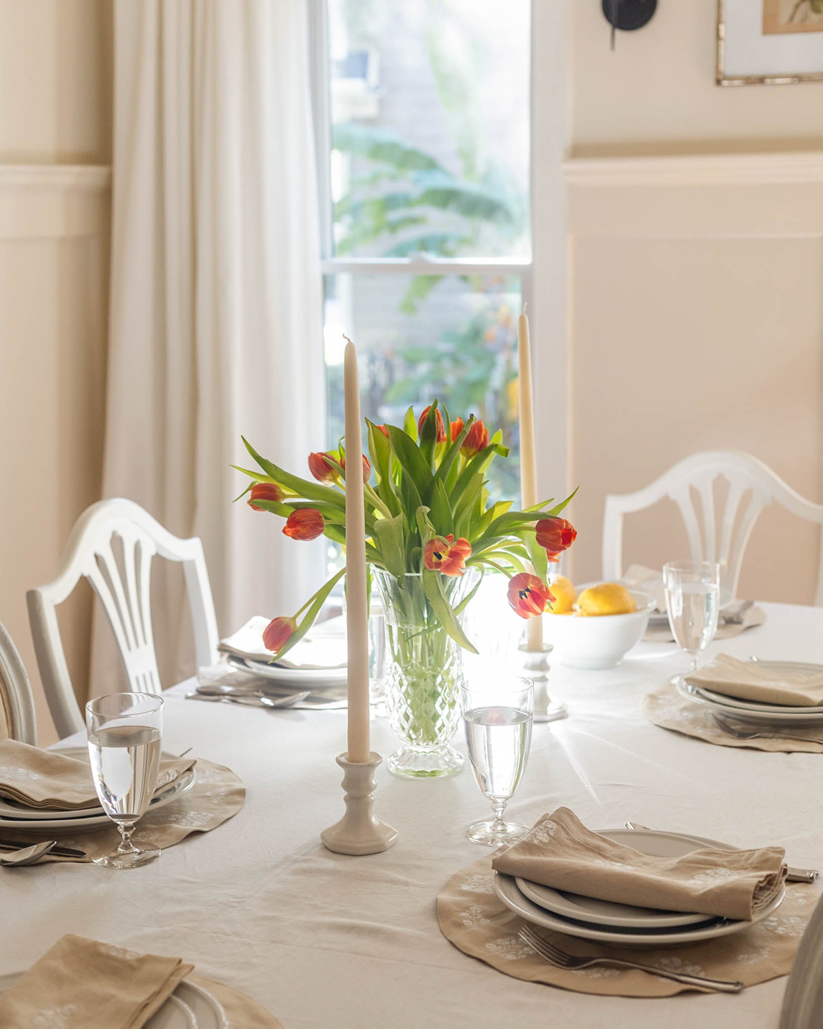 Classic embroidered round placemats available in set of 4 for an elevated Easter tablespace. Thoughtfully created in 100% cotton beige color  featuring intricate white floral embroidery, these table mats are designed to impress your guests with your chic tablescape. Measuring 15 inches in diameter, they are perfectly sized to accommodate various tableware, making them ideal for everything from Easter family gatherings to stylish hosting decor.
