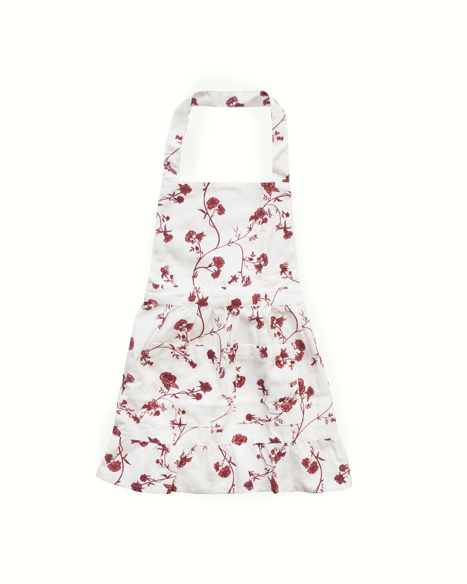 Organic cotton children’s apron featuring hand-drawn florals and adjustable ties for comfort. Comes with matching mommy apron
