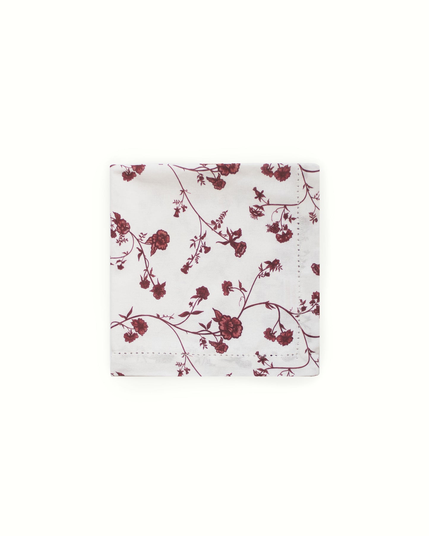 Organic cotton dinner napkins with refined hemstitch and red botanical print for timeless holiday decor.